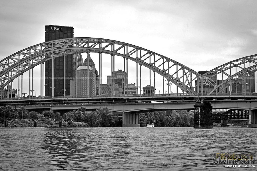 Black and white city of Pittsburgh with the 16th street bridge from the Allegheny River