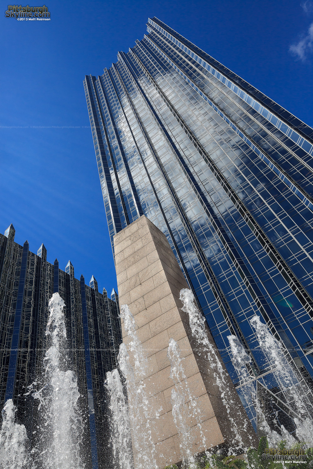 Water jets from the fountain at PPG Plaza