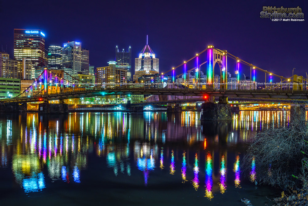 Rainbow colors on the Rachel Carson Bridge reflect in the Allegheny River